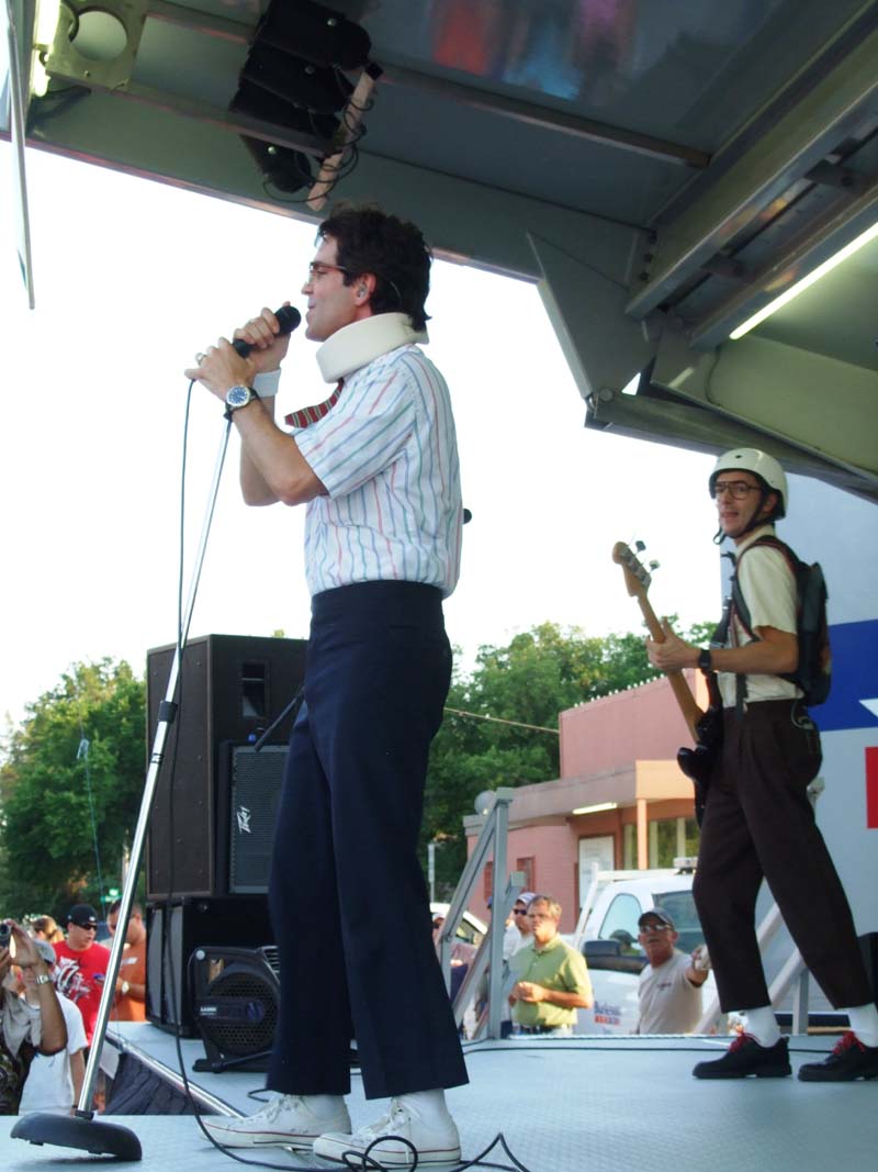 Photo of band members performing